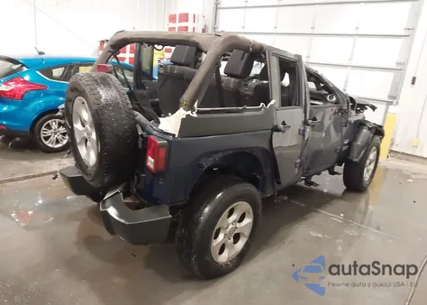 2013 Jeep Wrangler Unlimited Sahara z USA, uszkodzony, nr VIN 1C4BJWEGXDL518099